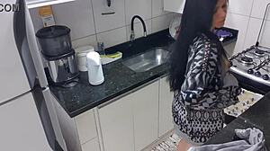 Sexy woman pleasures herself with a monster cock in the kitchen